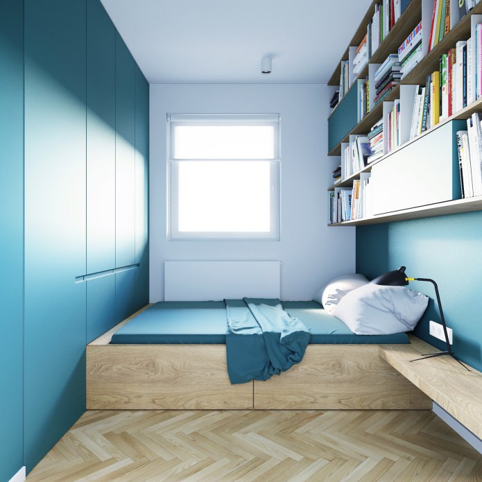 diseño de dormitorio en colores turquesa en un apartamento tipo estudio