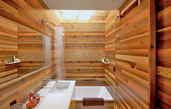 baño de estilo moderno con acabado de vetas de madera