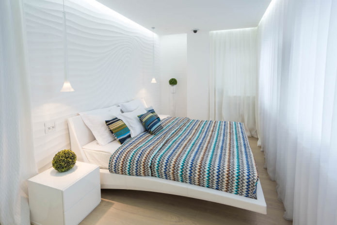 dormitorio decorado con paneles blancos 3d