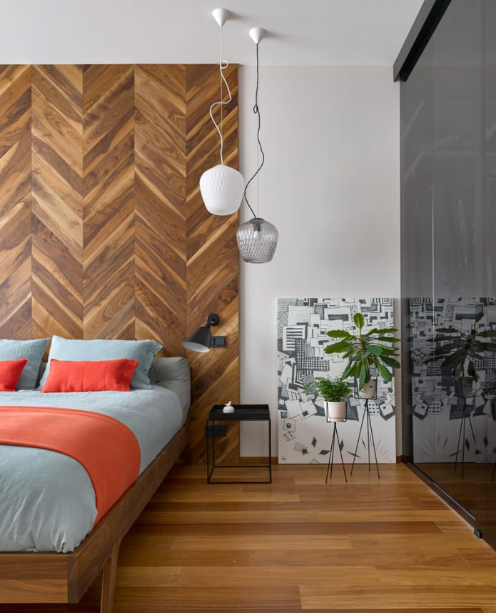 Dormitorio con pared de madera