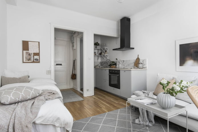 loob ng isang studio apartment na may istilong Scandinavian