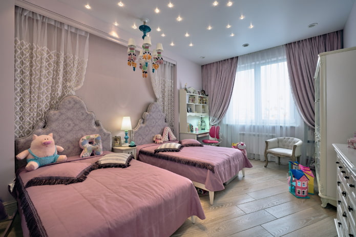 iluminación en el interior de un dormitorio para dos niñas