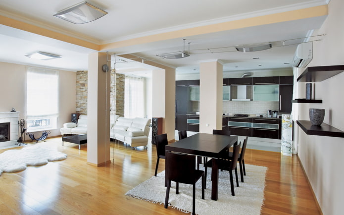 cocina, comedor y sala en una sola habitación