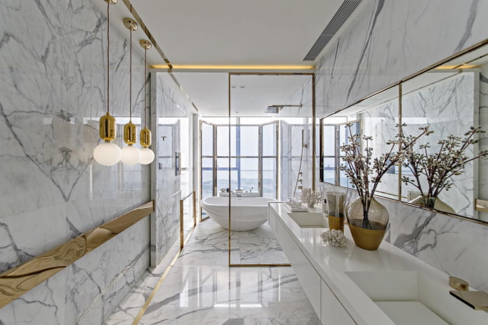 decoración de baño con mármol con oro