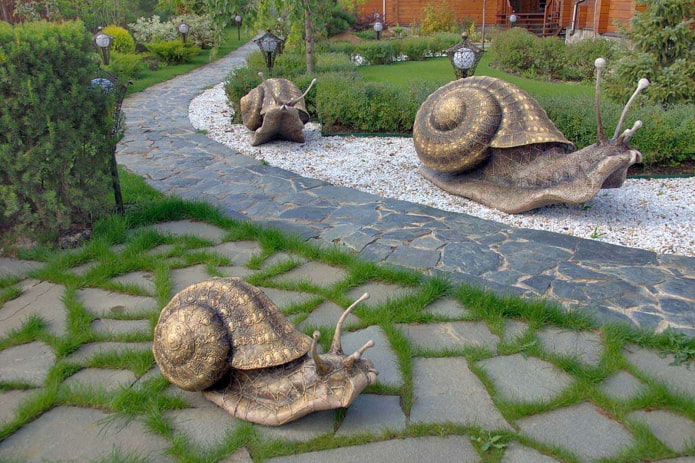 esculturas de caracol en el diseño del paisaje