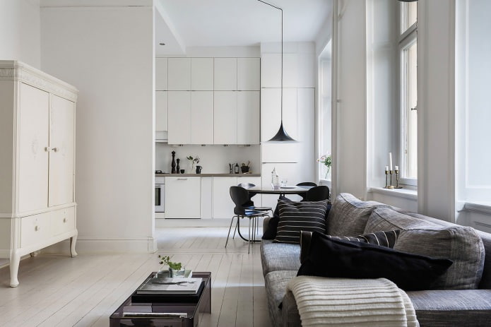 Interior de cocina-salón en blanco