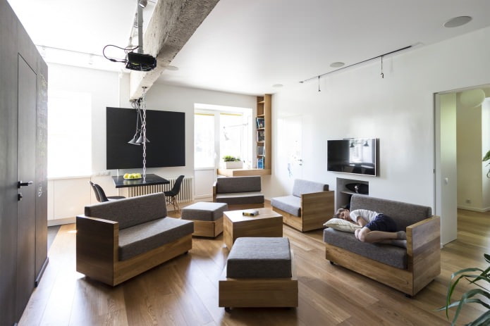 sala de estar en el diseño de un apartamento de tres habitaciones de 80 metros cuadrados. metro.