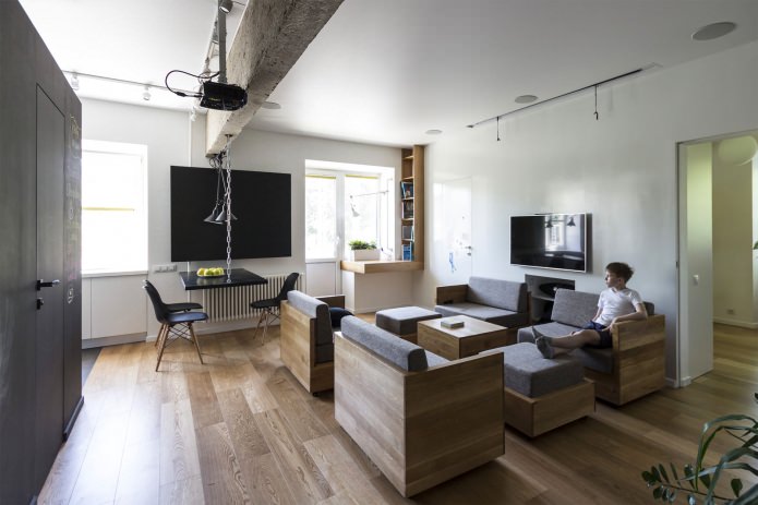 sala de estar en el diseño de un apartamento de tres habitaciones de 80 metros cuadrados. metro.